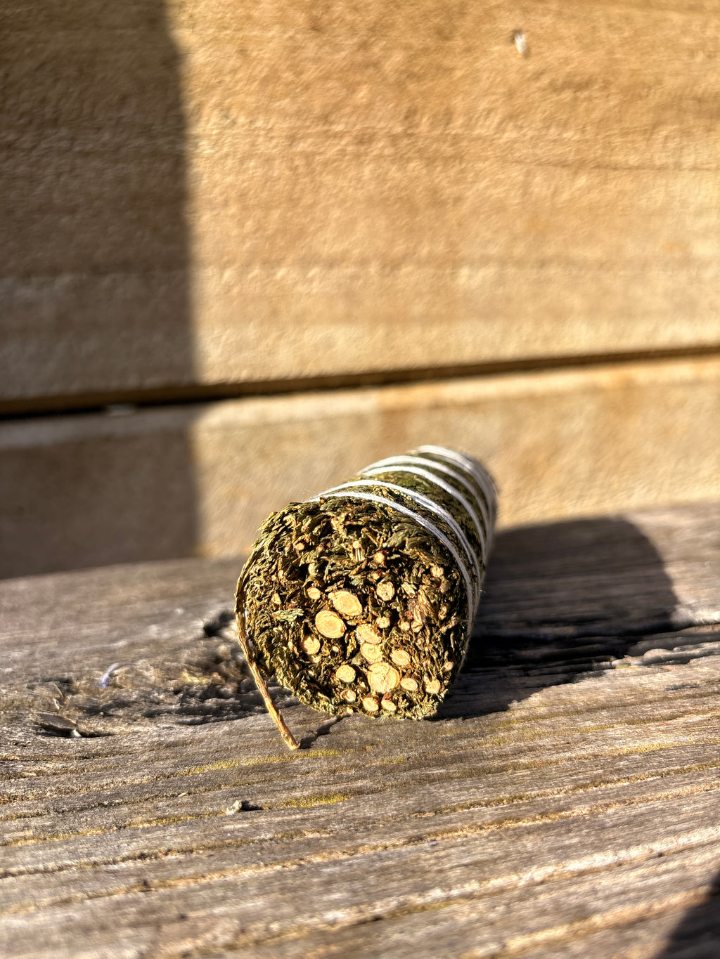 cedar bundle on a wooden surface
