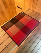 folded sauna mat nz wool red plaid detail