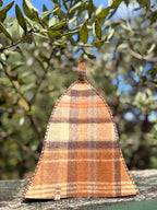 sauna hat nz wool brown plaid in a wooden surface