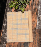 Beige plaid sauna mat NZ wool flat lay texture