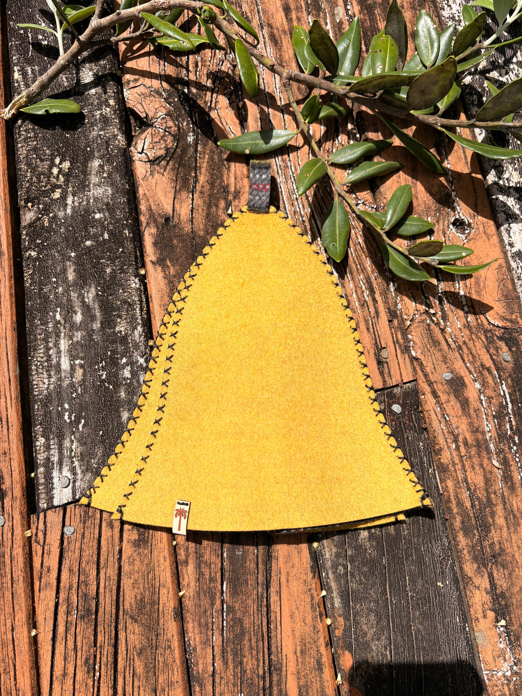 yellow wool sauna hat front view outdoor